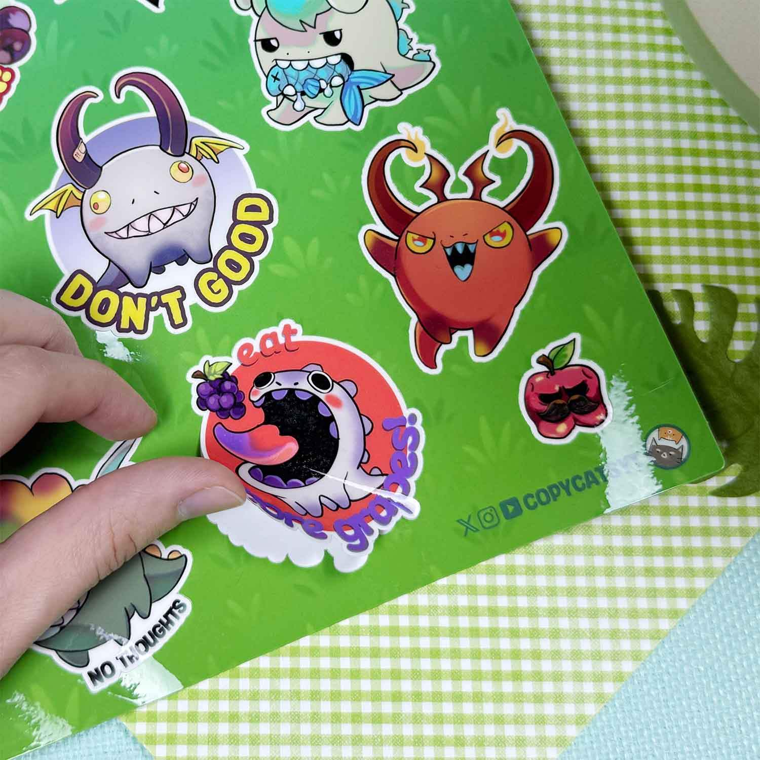 copycats dinosaur stickers being peeled