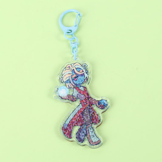 Colorful character keychain on a light green background