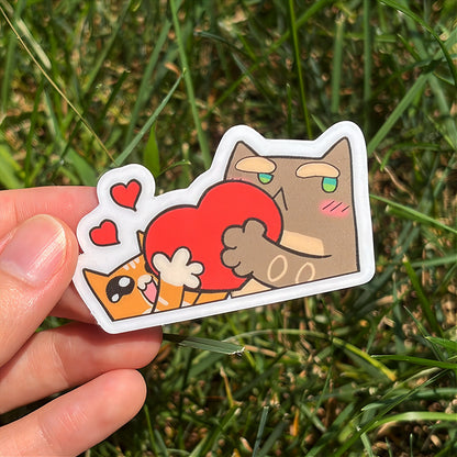 A hand holds a cartoon sticker next to a printed card pack titled "CopyCards Faithful Flock" on grass outdoors.