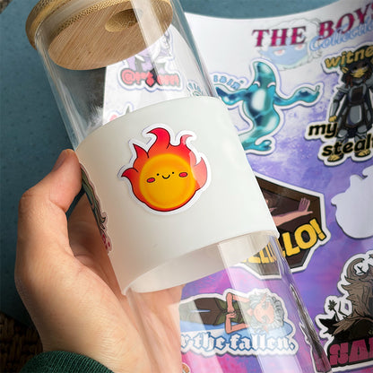Hand holding a clear bottle with a sun sticker, surrounded by colorful stickers on a blue background