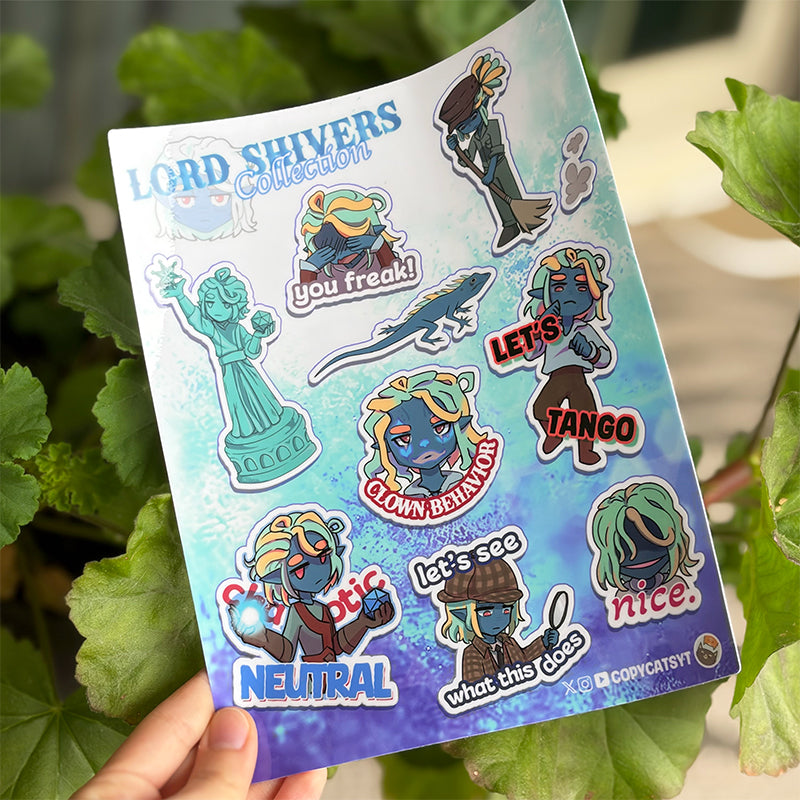 Sheet of 'Lord Shivers' themed stickers held in front of green plants