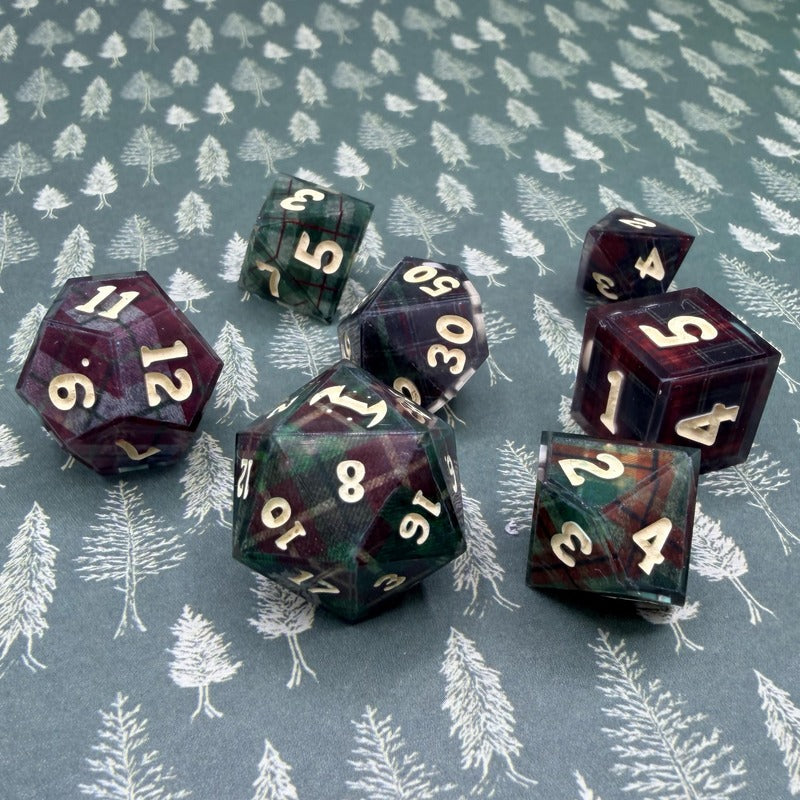 Set of polyhedral dice with numbers on a patterned background