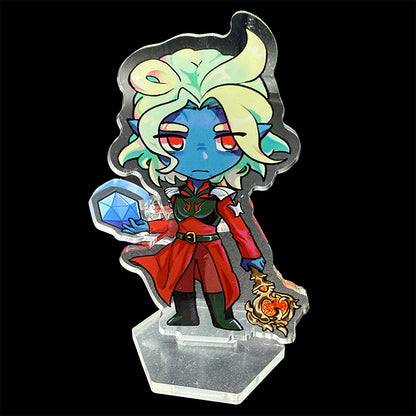 Colorful character figurine with a dice and staff on a reflective surface