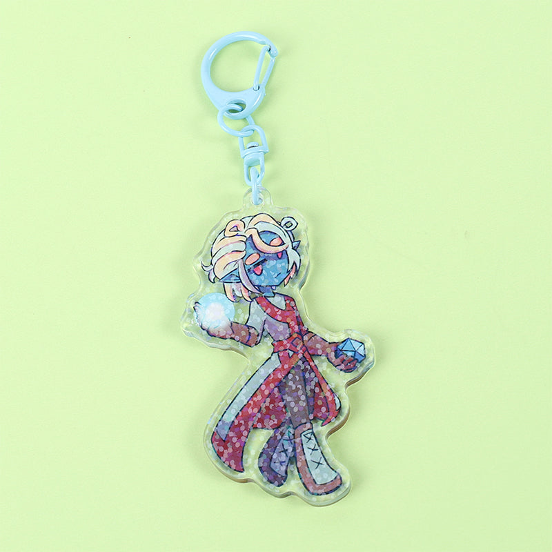 Colorful character keychain on a light green background