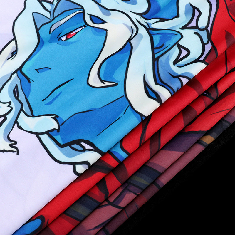 Colorful pillow with a blue and white drow design on a black background