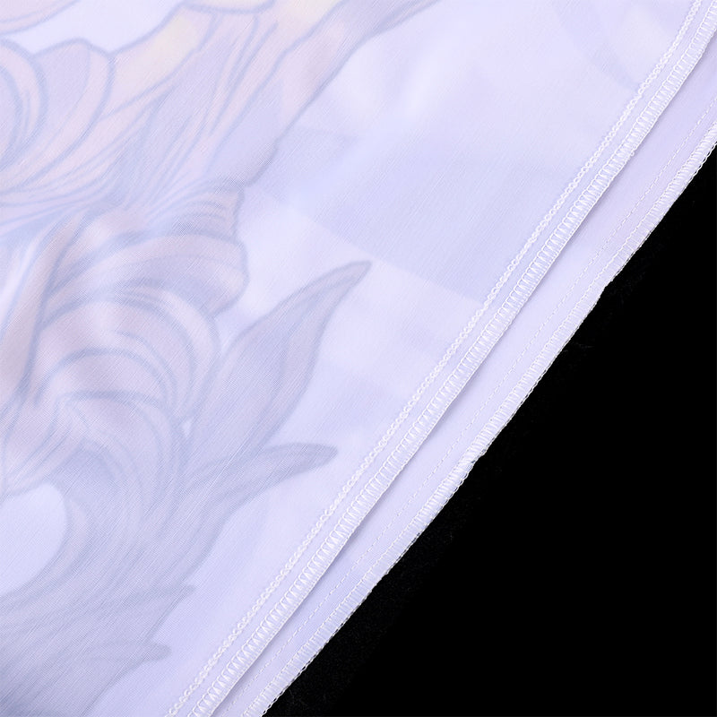 Close-up of a textured fabric with a floral pattern on a light purple background.